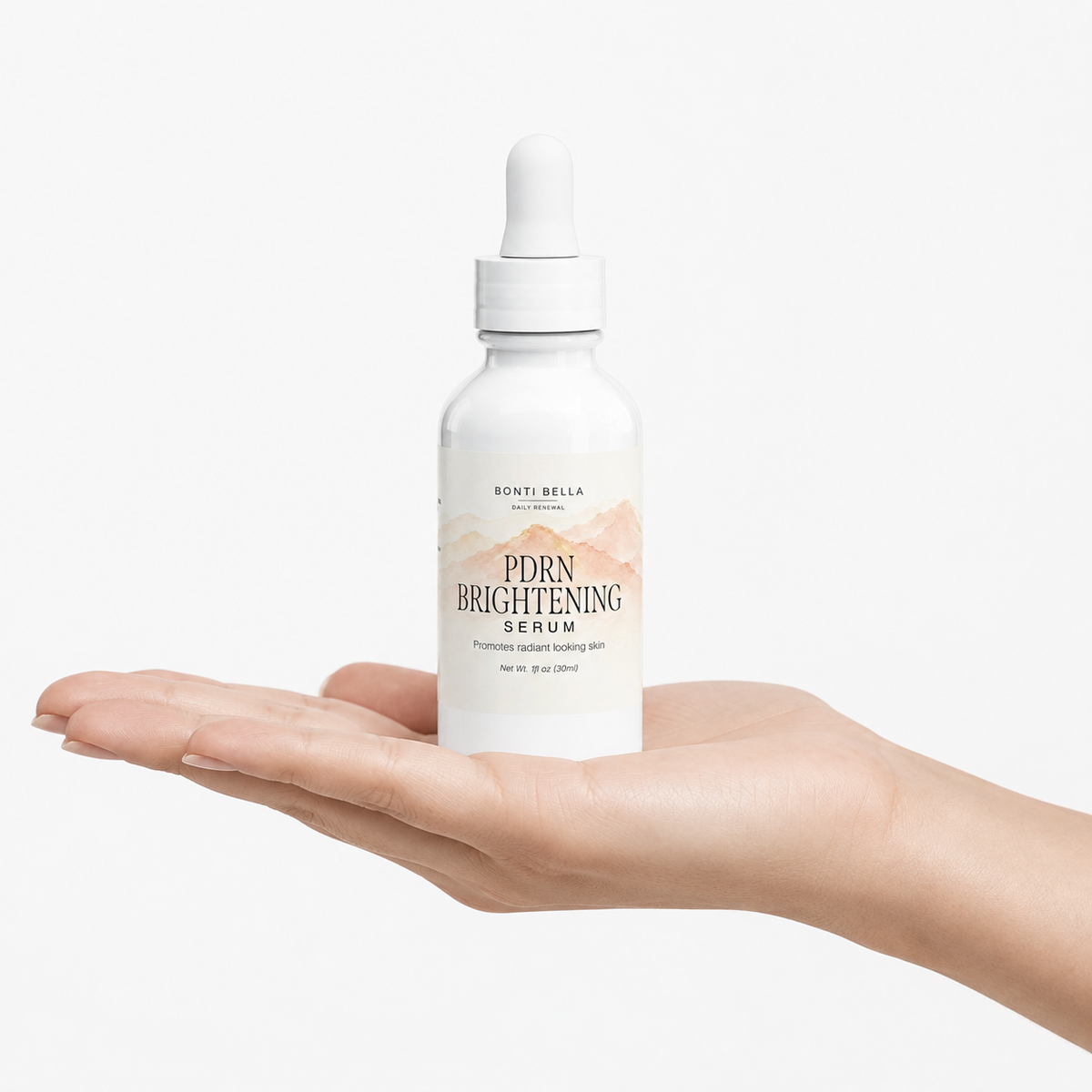Hand holding Bonti Bella PDRN Brightening Serum bottle