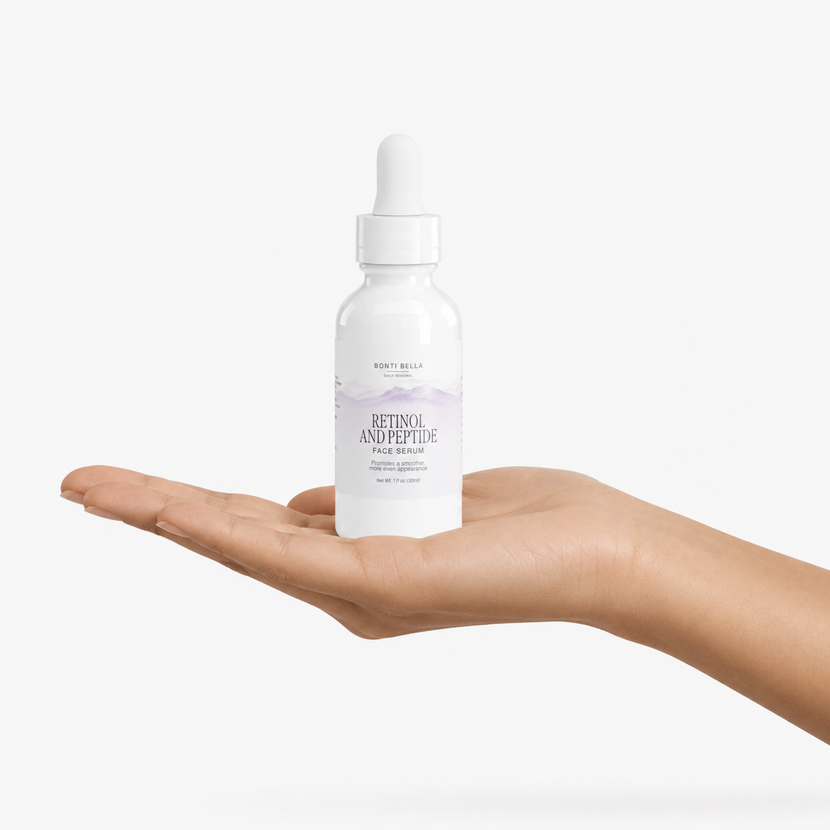 Hand holding Bonti Bella Retinol and Peptide Face Serum bottle