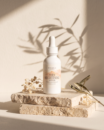 Bonti Bella PDRN Brightening Serum on travertine stone